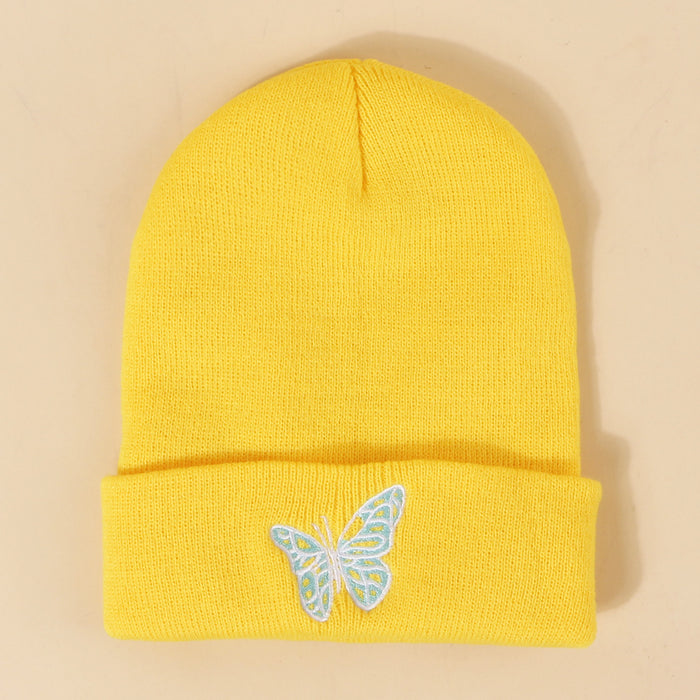 Lana de sombrero al por mayor Invierno invernal de mariposa bordada con bordado.