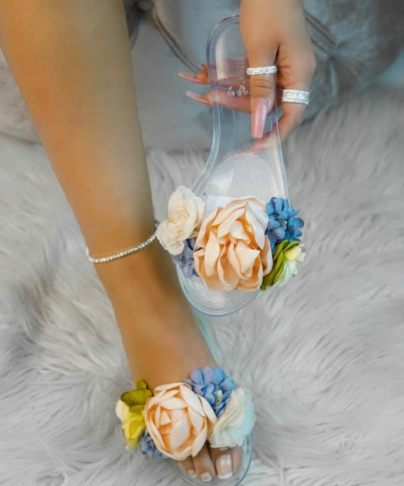 Sandales transparentes de grande fleur d'été