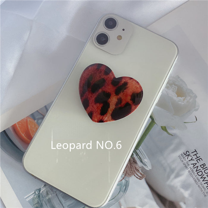 Wholesale Grips Mobile Phone Holder Leopard Print Heart Shaped Retractable Airbag Holder MOQ≥2 JDC-PS-weijiu009