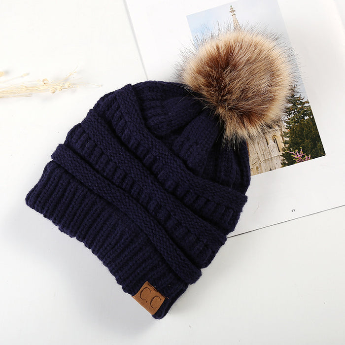 Wholesale Ponytail and Wool Ball Knitted Warm and Thick Wool Hats JDC-FH-HengYu001