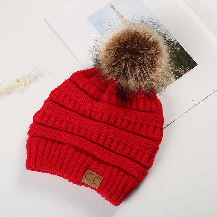 Wholesale Ponytail and Wool Ball Knitted Warm and Thick Wool Hats JDC-FH-HengYu001