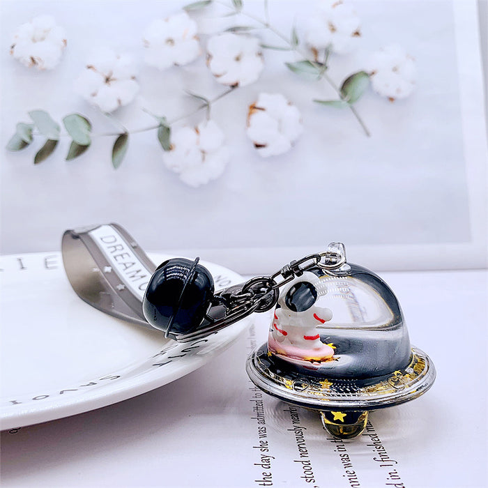 Wholesale Keychains For Backpacks personality black gold dream astronaut spaceship into oil keychain MOQ≥2 JDC-KC-DMF012