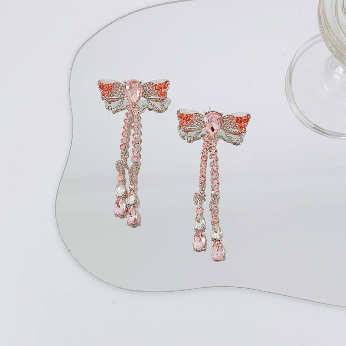 Wholesale Pink Gradient Stereoscopic Butterfly Tassel Alloy Earrings JDC-ES-Qiant010
