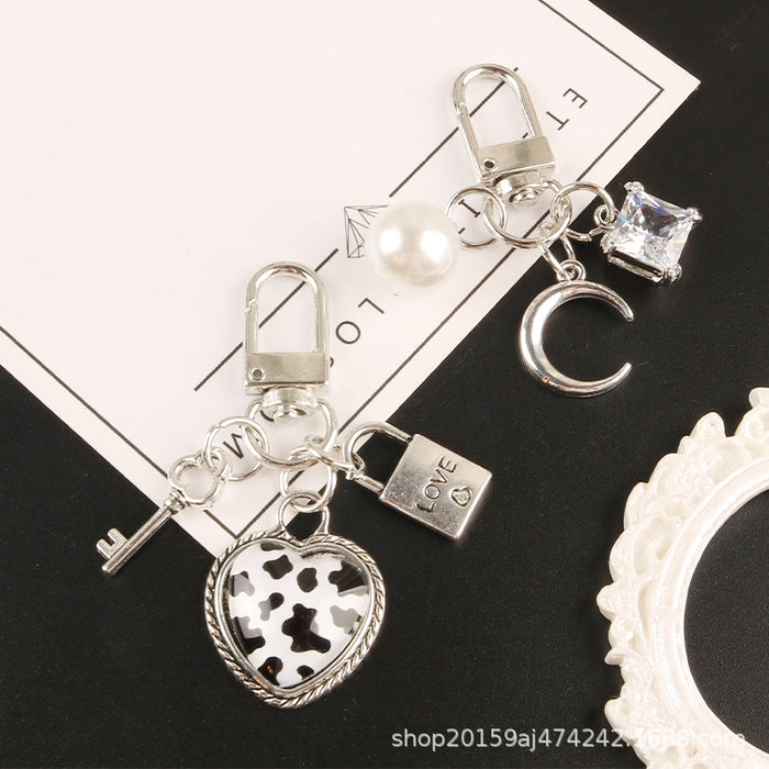 Wholesale Metal New Peach Heart Pearl Keychain MOQ≥2 JDC-KC-YiHan013