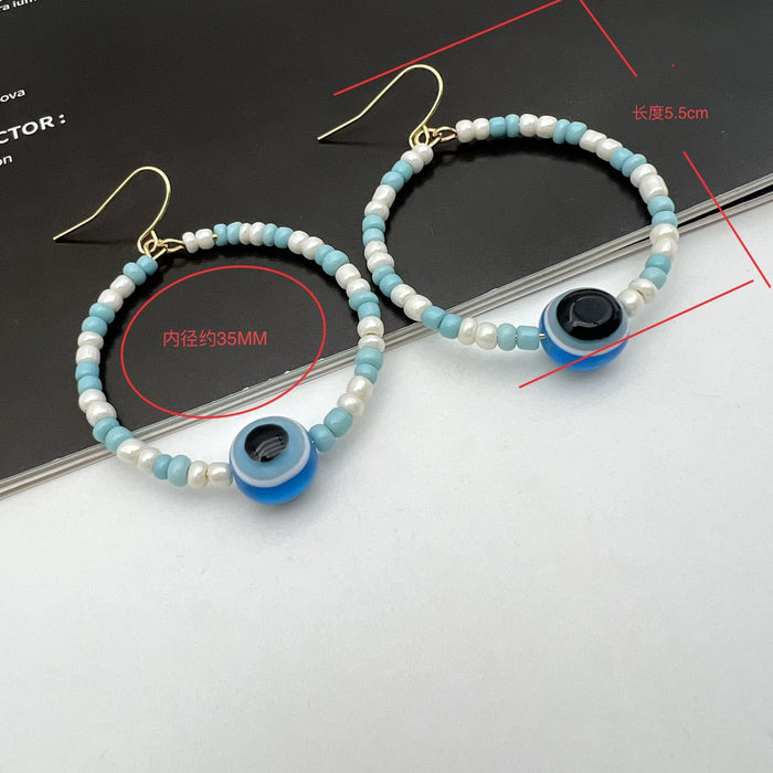Pendientes al por mayor Beads de arroz de metal Ojos azules Boho Moq≥2 JDC-ES-Qingh003