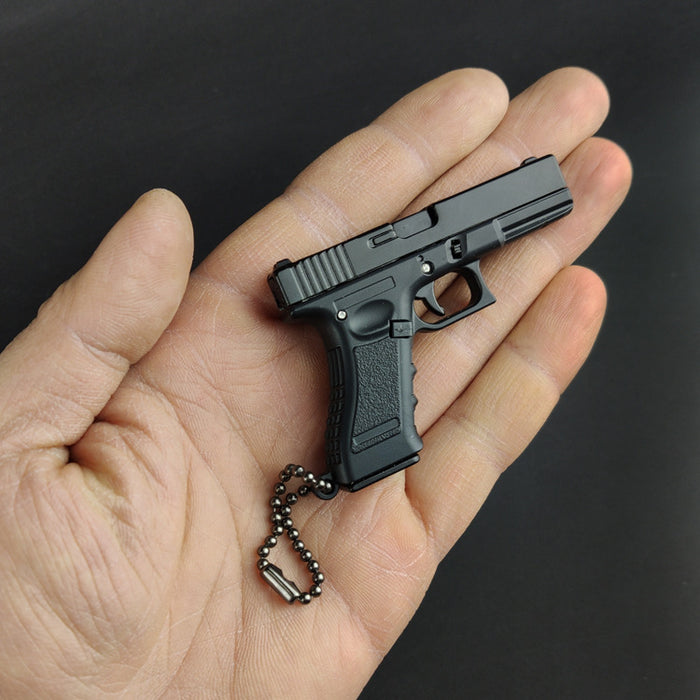 Keychains al por mayor para mochilas Modelo de pistola de plástico de aleación llavero JDC-KC-YAZ002