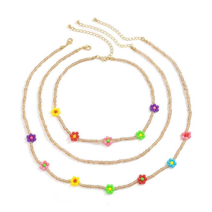 Imitation en gros de couleur perle tressée perles de riz petite chaîne de clavicule de marguerite jdc-ne-gsxr063
