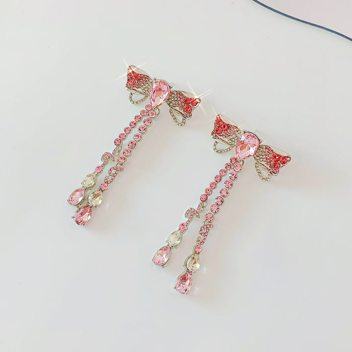 Wholesale Pink Gradient Stereoscopic Butterfly Tassel Alloy Earrings JDC-ES-Qiant010