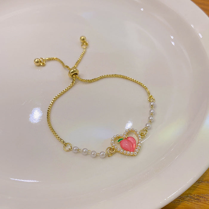 Wholesale Bracelet Alloy Peach Pull Pearl Bracelet Earring Set JDC-BT-SW009