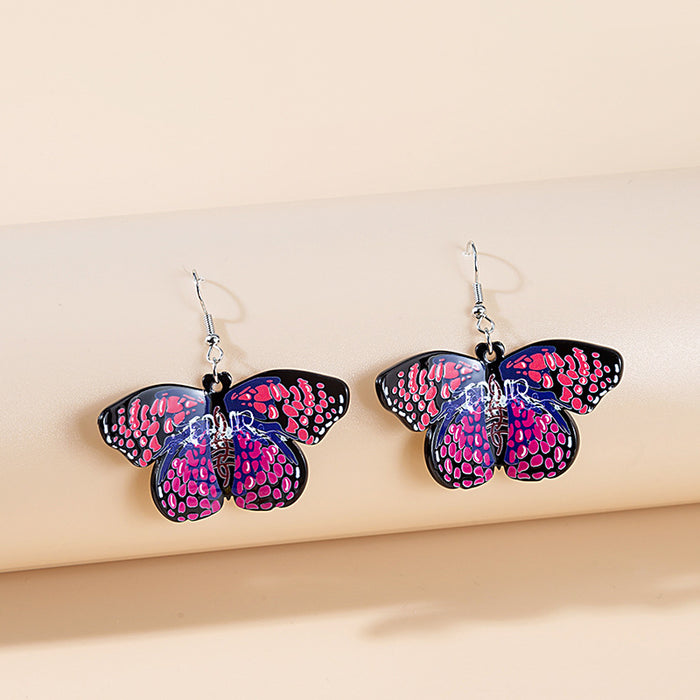 Pendientes acrílicos de mariposa de vidrio colorido al por mayor JDC-ES-MDD010