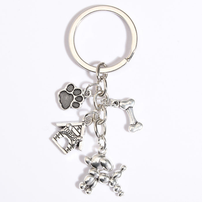 Wholesale Keychains Zinc Alloy Bone Footprint Doll Simple Robot Dog MOQ≥2 JDC-KC-XiangH021