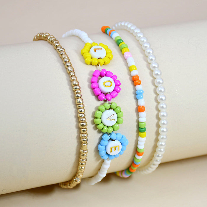 Wholesale Holiday Wind Flower LOVE Handmade Rice Beads Stretch Bracelet JDC-BT-YF015