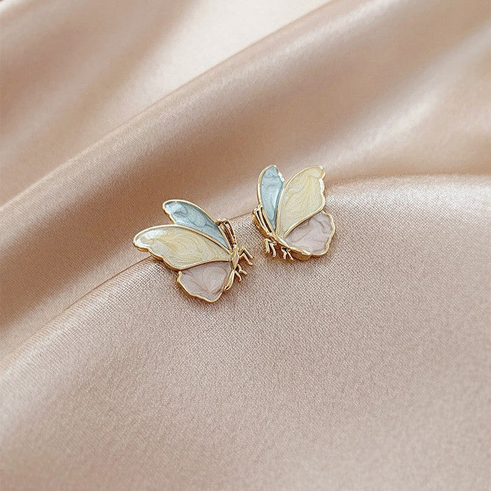Wholesale Earrings Alloy Rhinestone Pearl Butterfly Fringe No Piercing   JDC-ES-WeiH036