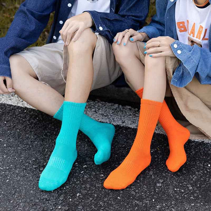 Calcetines al por mayor algodón sólido de color sólido que absorbe los calcetines deportivos JDC-SK-Zeshi001