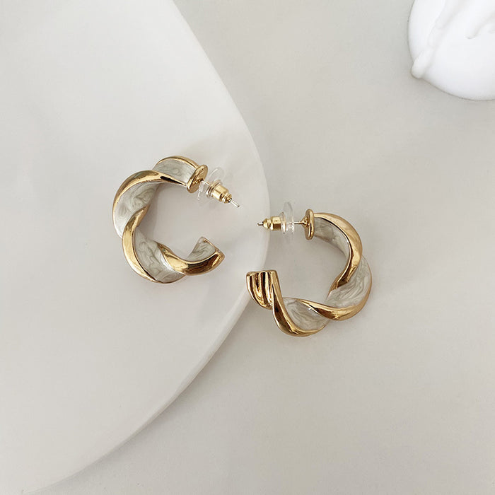 Wholesale Oil Spiral Stud Earrings Metal Earrings JDC-ES-LIUM052