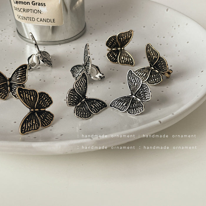 Wholesale Earrings Alloy Bronze Stereo Retro Butterfly Stud Earrings JDC-ES-Tql006