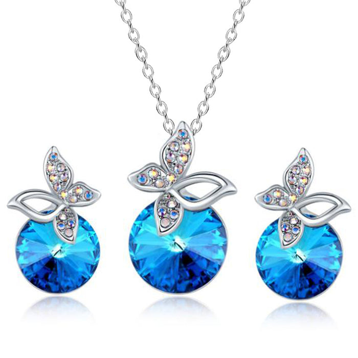 Temperamento al por mayor Collar de cristal azul Pendientes de mariposa azul