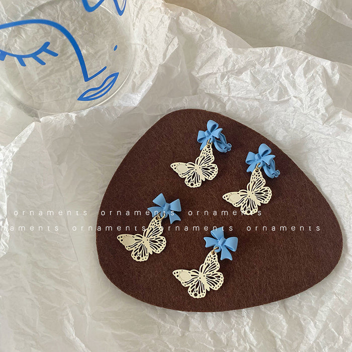Wholesale Earrings Alloy Hollow Butterfly Blue Bow Stud Earrings JDC-ES-Tql012