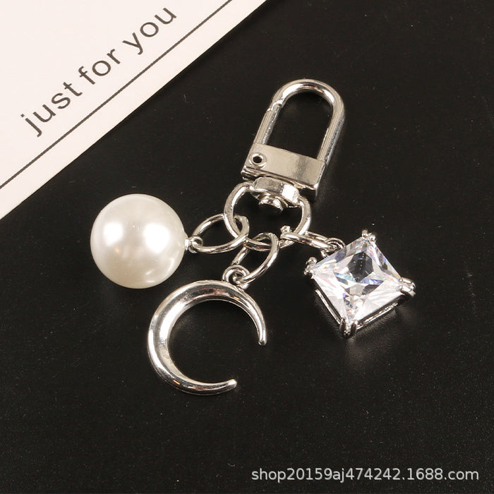 Wholesale Metal New Peach Heart Pearl Keychain MOQ≥2 JDC-KC-YiHan013