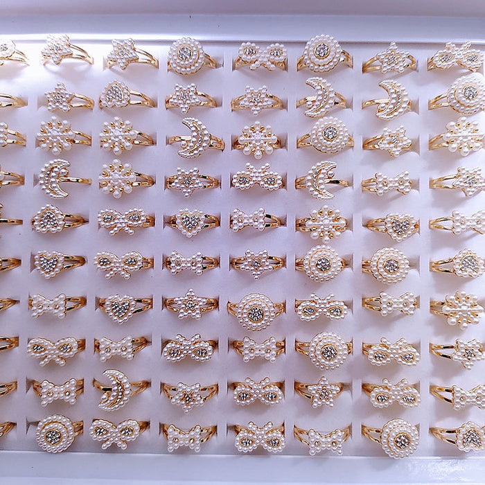 Wholesale Random Plastic Pearl KC Gold Plated Rings JDC-RS-KuaH006