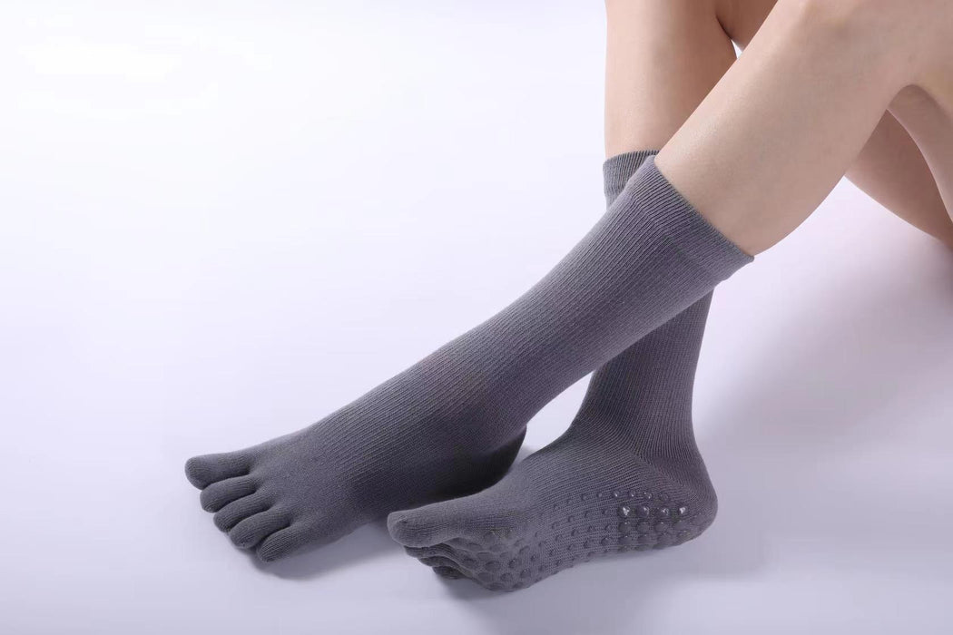 Calcetín al por mayor de algodón PVC Yoga sin deslizamiento aeróbicos resistentes al desgaste Five dedo calcetines jdc-sk-tys001