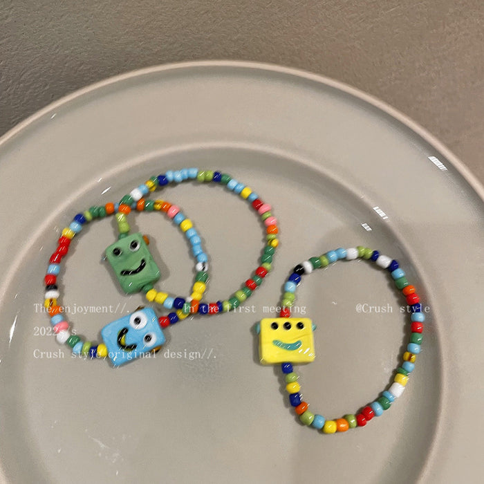 Wholesale Cartoon Little Monster Colorful Beaded Ceramic Bracelet JDC-BT-YQ001