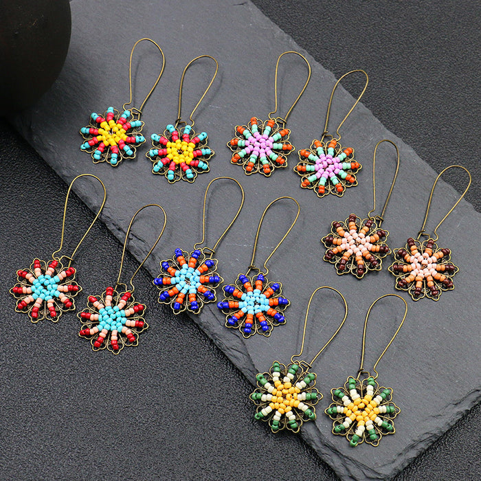 Wholesale earrings alloy tassel sunflower JDC-ES-momo009
