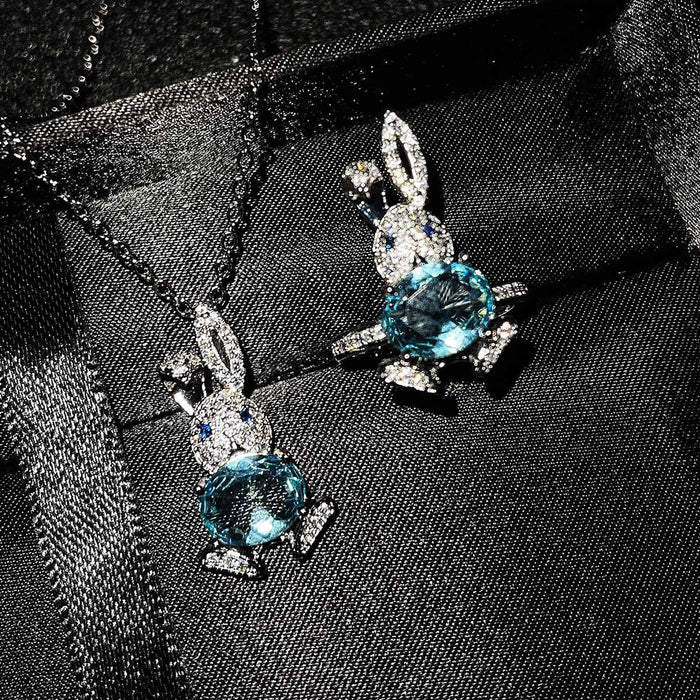 Pendientes de diamantes de micro insultos al por mayor imitación de topacio azul natural cuidador de conejo