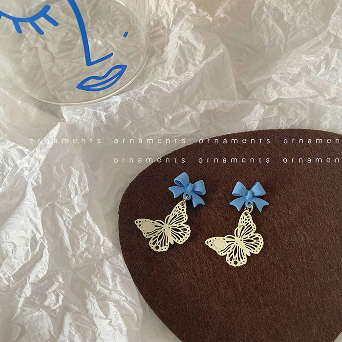 Wholesale Earrings Alloy Hollow Butterfly Blue Bow Stud Earrings JDC-ES-Tql012
