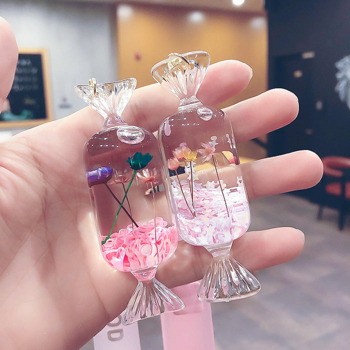 Wholesale creative candy immortal flower into oil acrylic floating keychain JDC-KC-FeiRun074