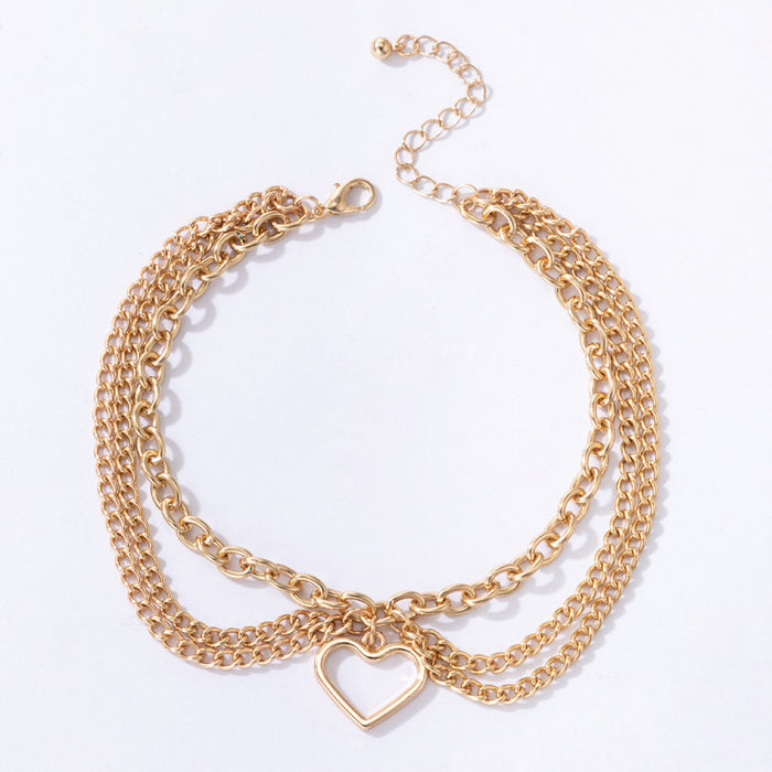 Jewelry WholesaleWholesale gold buckle heart chain tassel snake three-layer alloy ankle chain JDC-AS-Yg001 Anklet 陌茗 %variant_option1% %variant_option2% %variant_option3%  Factory Price JoyasDeChina Joyas De China