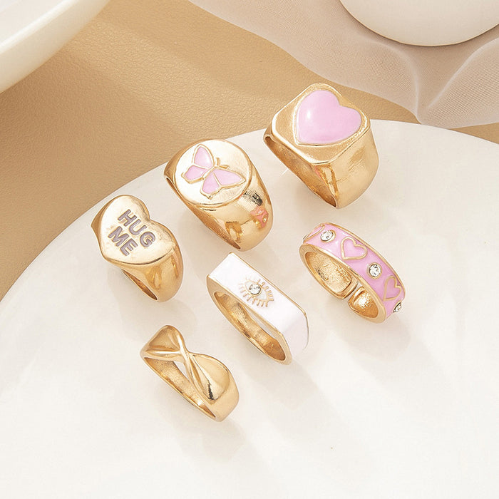 Anillos al por mayor aleación de corazón Exagerated Heart Pink Butterfly Letters 6pcs Ring Juego de anillo JDC-RS-Zhulong005