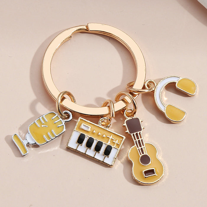 Wholesale violin note keyboard headphone key pendant MOQ≥2 JDC-KC-XiangH010