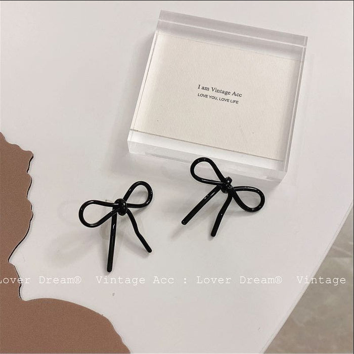 Wholesale Acrylic Acrylic Bow Earrings JDC-ES-Lfm023