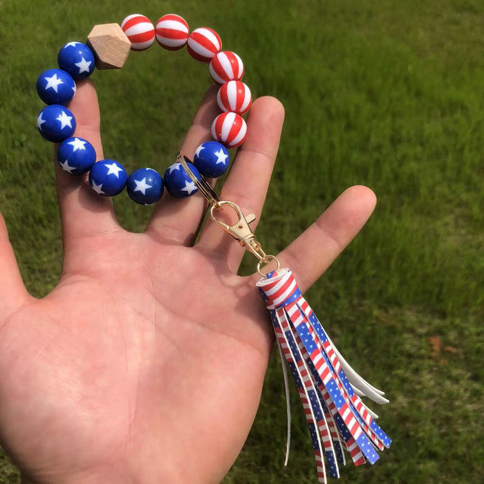 En gros en bois perlé américain drapeau perlé de bracelet de frappe du gland