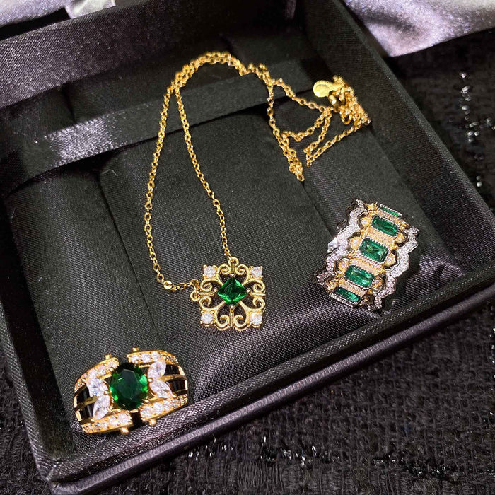 Wholesale Ring Copper Imitation Emerald Gold Plated Inlaid Lace Carved Necklace Set JDC-RS-ZhenR037