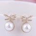 Wholesale alloy imitation pearl bow earrings JDC-ES-wy007 Earrings JoyasDeChina Gold 019071116 Wholesale Jewelry JoyasDeChina Joyas De China