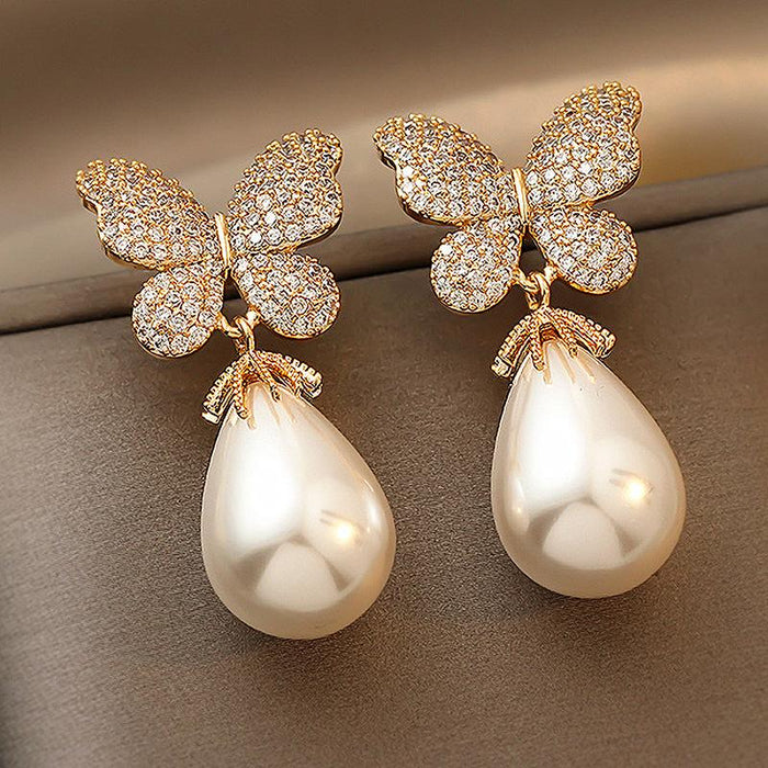 Wholesale alloy pearl rhinestone butterfly earrings JDC-ES-GSJQ001 Earrings JoyasDeChina Silver Post Wholesale Jewelry JoyasDeChina Joyas De China