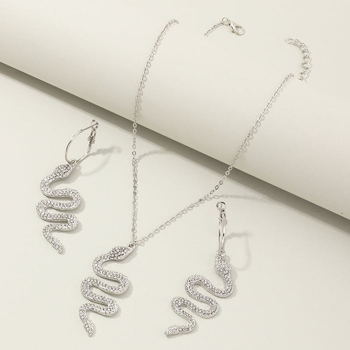 Wholesale alloy Rhinestone-studded snake earrings necklaces set JDC-ES-NZ078 Earrings 奈珠 SZ0415baik Wholesale Jewelry JoyasDeChina Joyas De China
