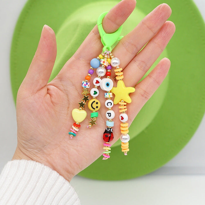 Wholesale Boho Resin Soft Pottery Hand Woven Beaded Flower Smiley Lanyard Keychain JDC-KC-Yuxz001 Keychains 煜星珠 QT-K210250A Wholesale Jewelry JoyasDeChina Joyas De China