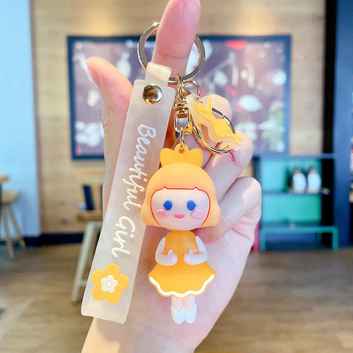 Wholesale Cartoon cute girl PVC keychain JDC-KC-JG078 Keychains 金葛 yellow Wholesale Jewelry JoyasDeChina Joyas De China