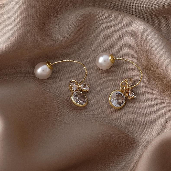 Wholesale Earrings gold U-shaped bow knot zircon pearl copper JDC-ES-W286 Earrings JoyasDeChina Main drawing Wholesale Jewelry JoyasDeChina Joyas De China