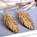 Wholesale Earrings Golden Leaf metal Alloy JDC-ES-SK011 Earrings JoyasDeChina Wholesale Jewelry JoyasDeChina Joyas De China