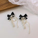 Wholesale Earrings Pearl crystal butterfly tassel White JDC-ES-W101 Earrings JoyasDeChina A black Wholesale Jewelry JoyasDeChina Joyas De China