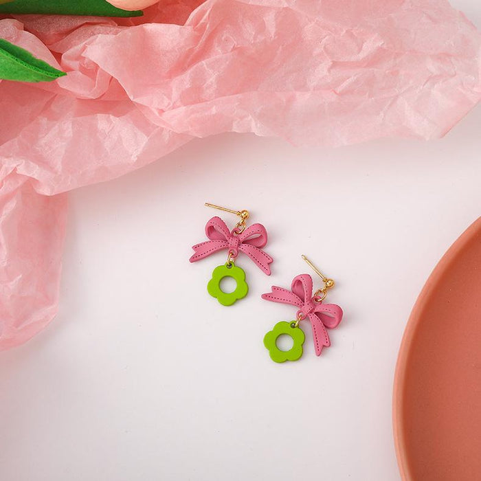 Wholesale Earrings Pink butterfly Alloy JDC-ES-W220 Earrings JoyasDeChina Main drawing Wholesale Jewelry JoyasDeChina Joyas De China