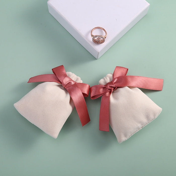 Wholesale flannel jewelry gift packaging JDC-JP-LinL001 Jewelry packaging 霖栾 beige Bean Paste Pink Ribbon 7*9cm Wholesale Jewelry JoyasDeChina Joyas De China