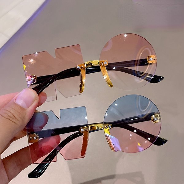 Wholesale frameless resin Sunglasses JDC-SG-KD105 Sunglasses 珂盾 Wholesale Jewelry JoyasDeChina Joyas De China