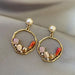 Wholesale gold alloy hollow ring earrings JDC-ES-GSXY033 Earrings JoyasDeChina Golden Wholesale Jewelry JoyasDeChina Joyas De China