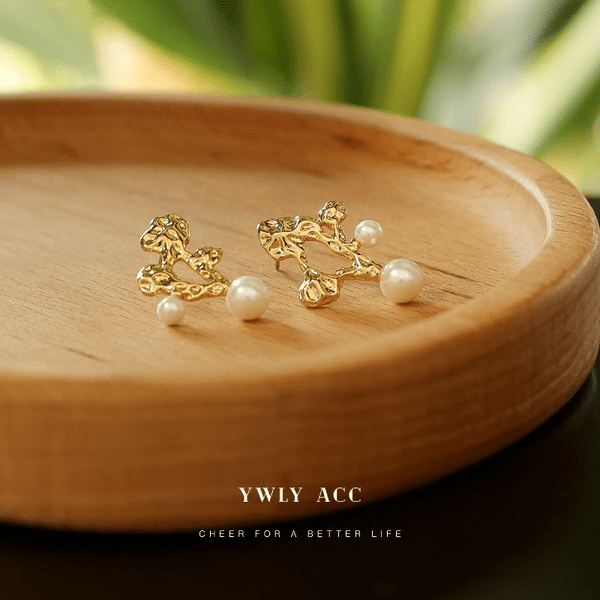 Wholesale Gold Brass Asymmetric Lava Highlight Pearl Hollow Stud Earrings JDC-ES-YWLY050 Earrings 丽轶 Wholesale Jewelry JoyasDeChina Joyas De China
