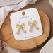 Wholesale pearl bow earrings JDC-ES-W325 Earrings JoyasDeChina Wholesale Jewelry JoyasDeChina Joyas De China